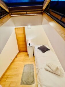 Habitación con cama individual en Ático en Extrada Xeral